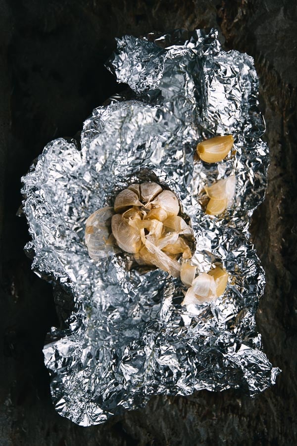 making-rose-harissa-4 Roast garlic wrapped in foil.