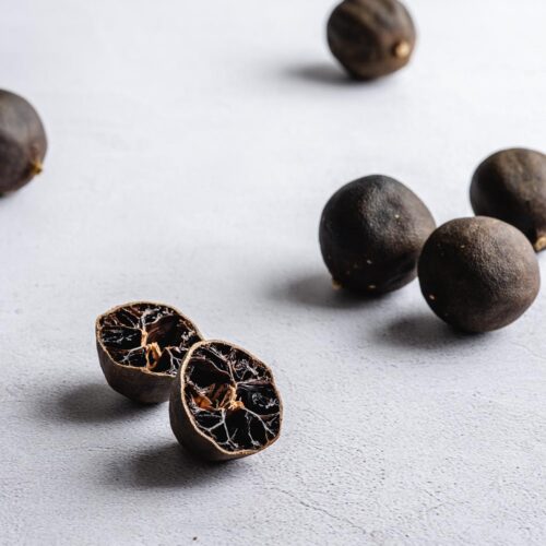 Dried limes turn dark brown, almost black, and become hollow.