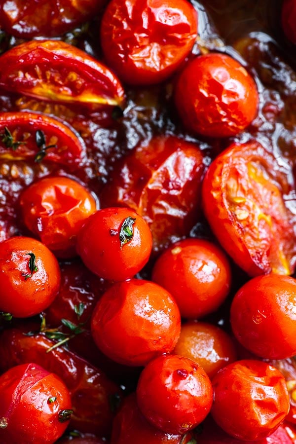 Close-up shot of harissa roasted cherry tomatoes.