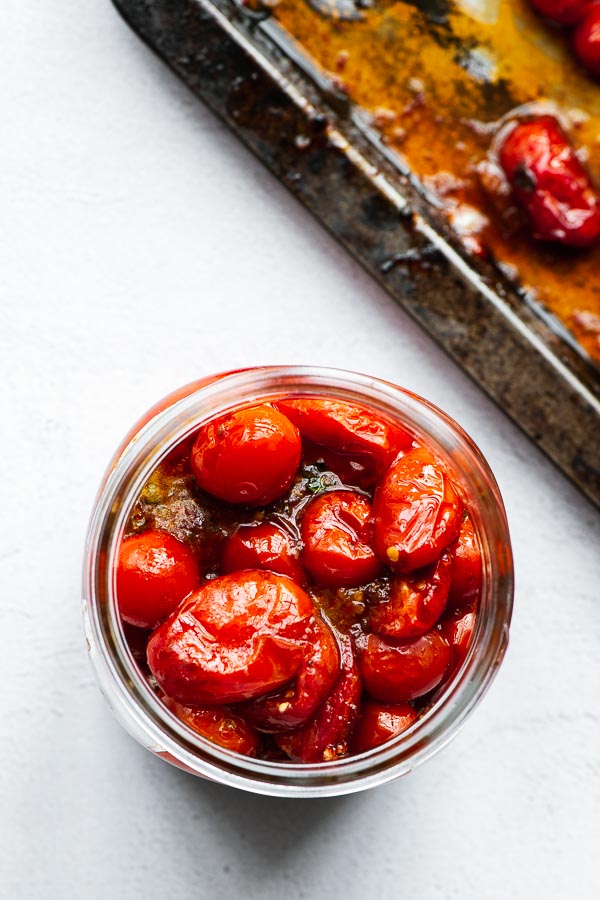Oven roasted cherry tomatoes in a jar.