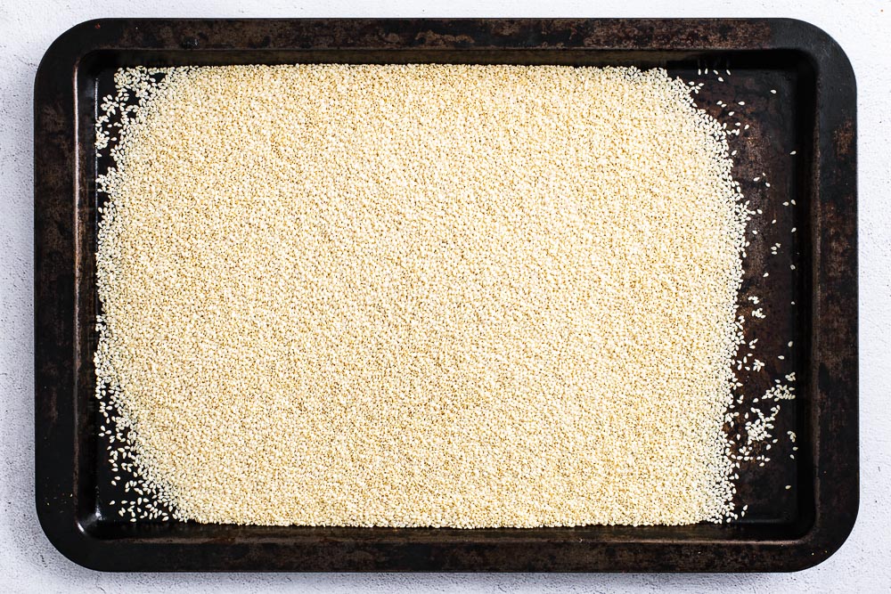 Sesame seeds in a baking tray.