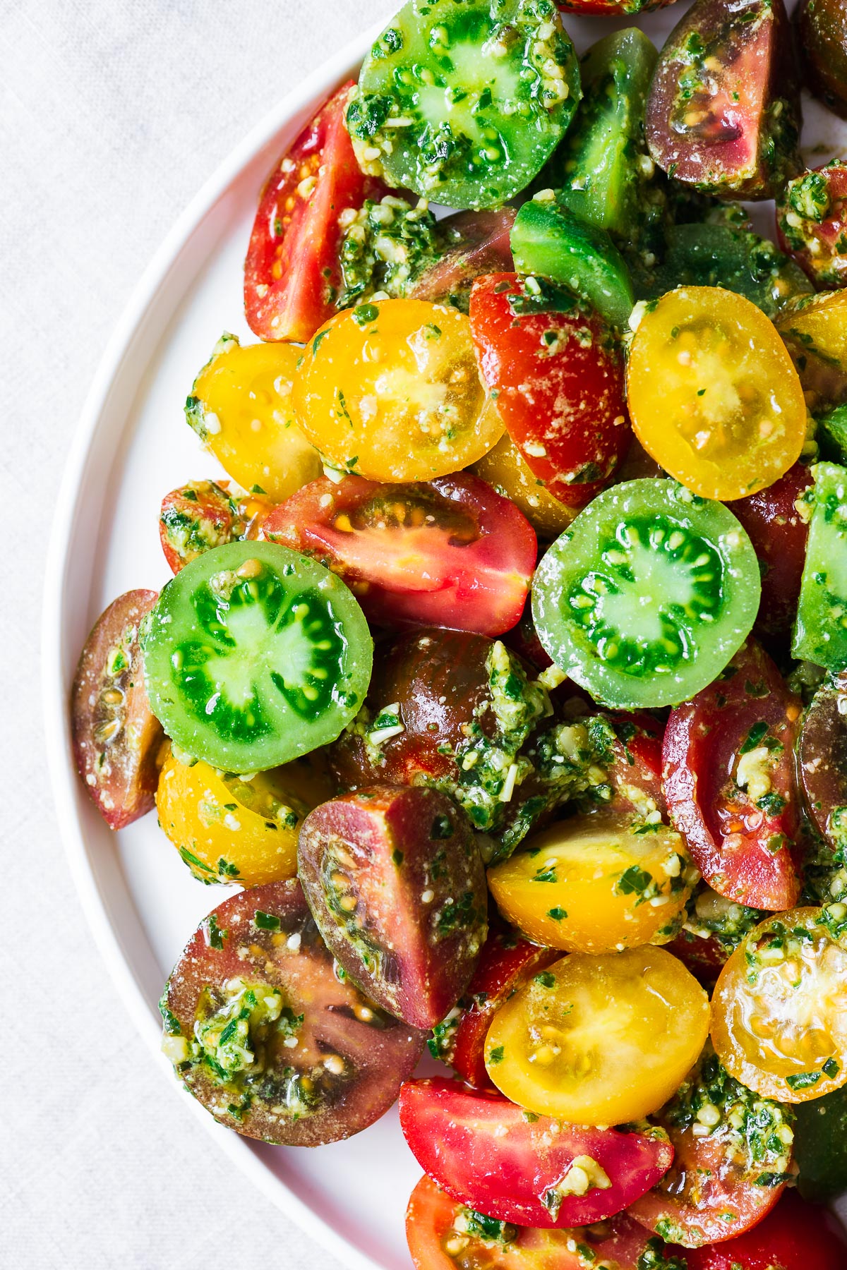 Heirloom tomato salad with homemade vegan basil pesto.