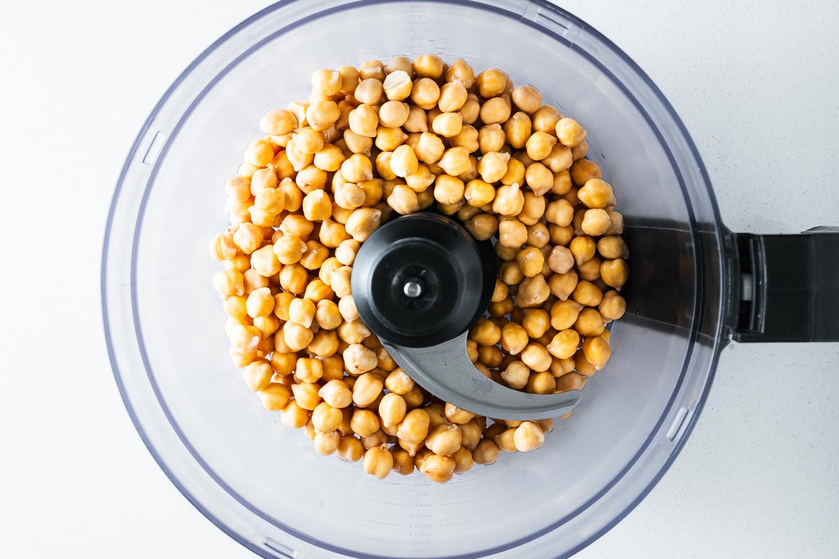 Dried chickpeas that were soaked overnight in cold water in the bowl of a food processor.