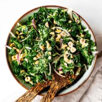 Chopped kale salad with tahini dressing, red onions and toasted hazelnuts.