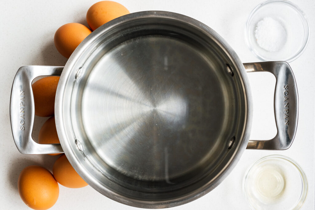 A pot with water to boil eggs.