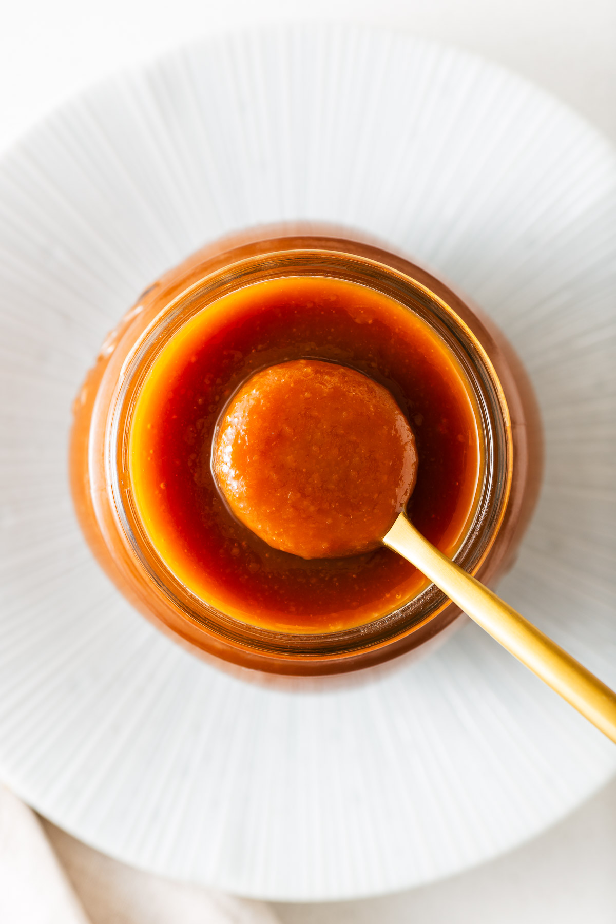 A jar of sweet miso sauce viewed from above.