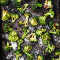 A sheet pan with broccoli roasted in a hot oven from frozen.