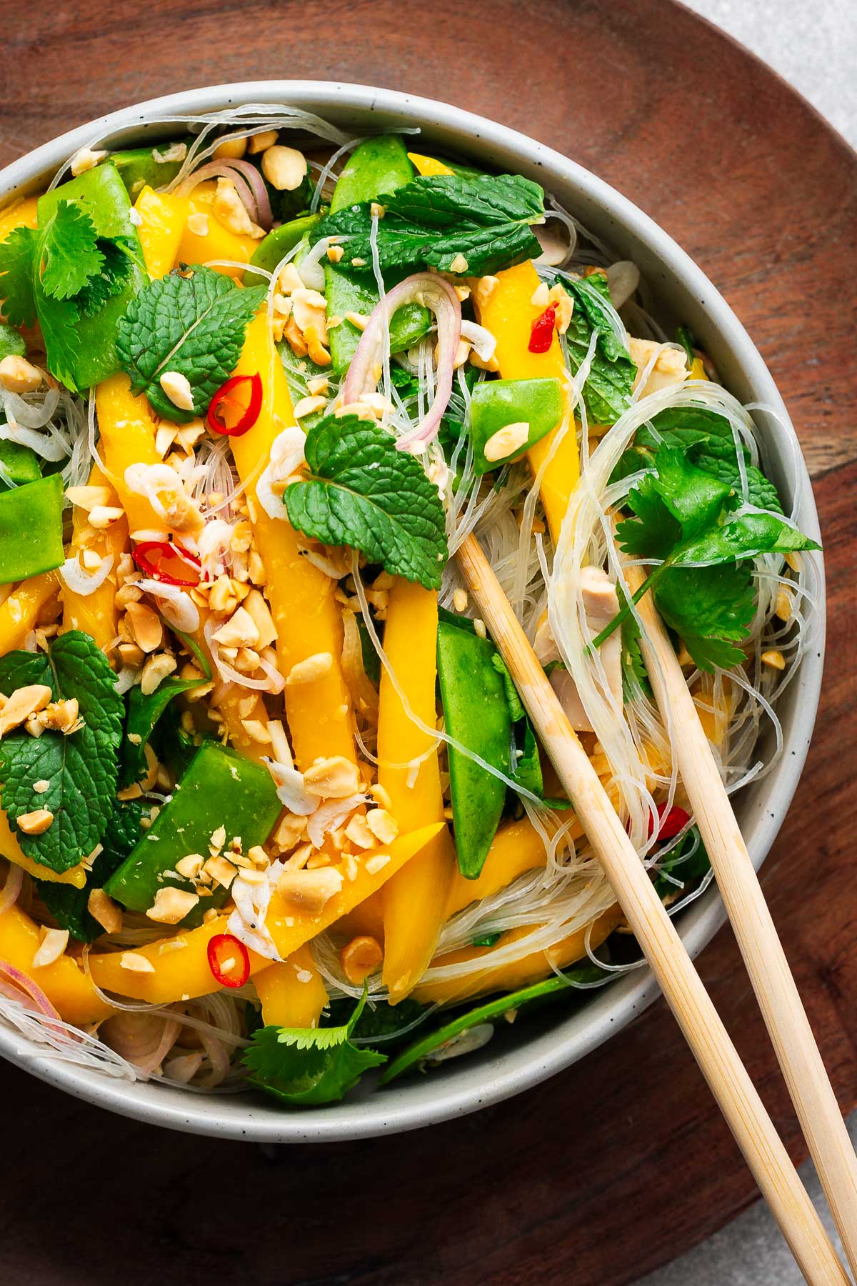 Thai mango salad served with glass noodles and more vegetables for an easy mango noodle salad.